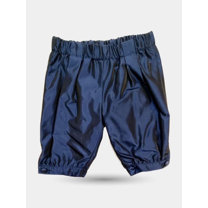 Pantaloni blu a sbuffo con elastico in vita e polsino abbottonato