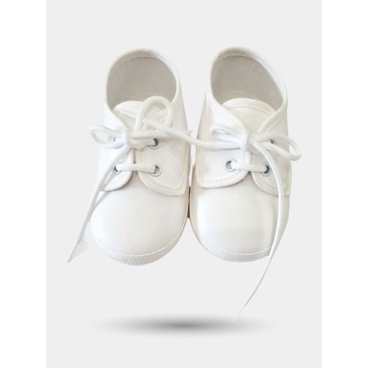 Scarpe battesimo Aletta color crema da neonato viste dall'alto con lacci