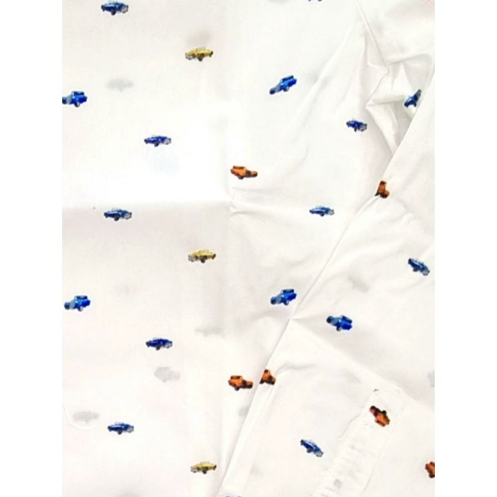 Dettaglio della stampa di macchinine blu, arancio e gialle