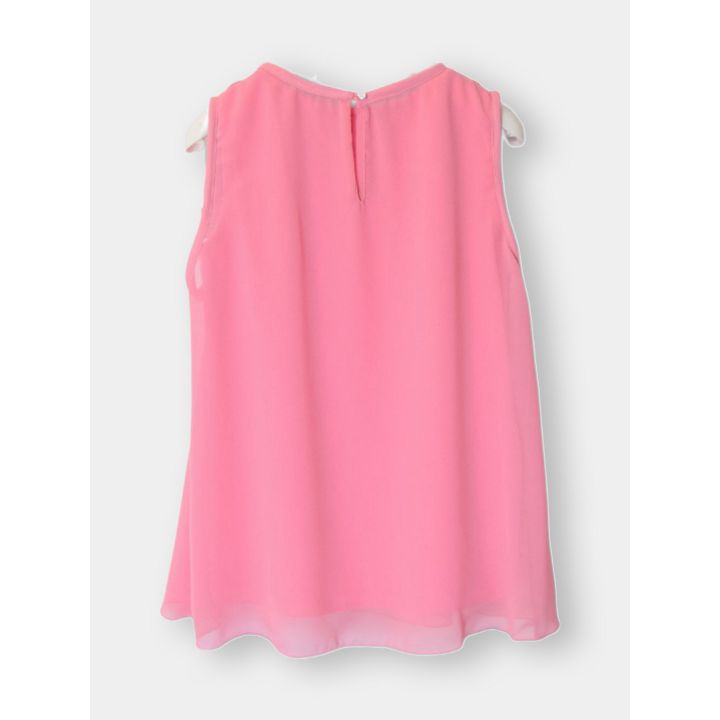 Retro della blusa rosa con apertura a goccia e bottoncino
