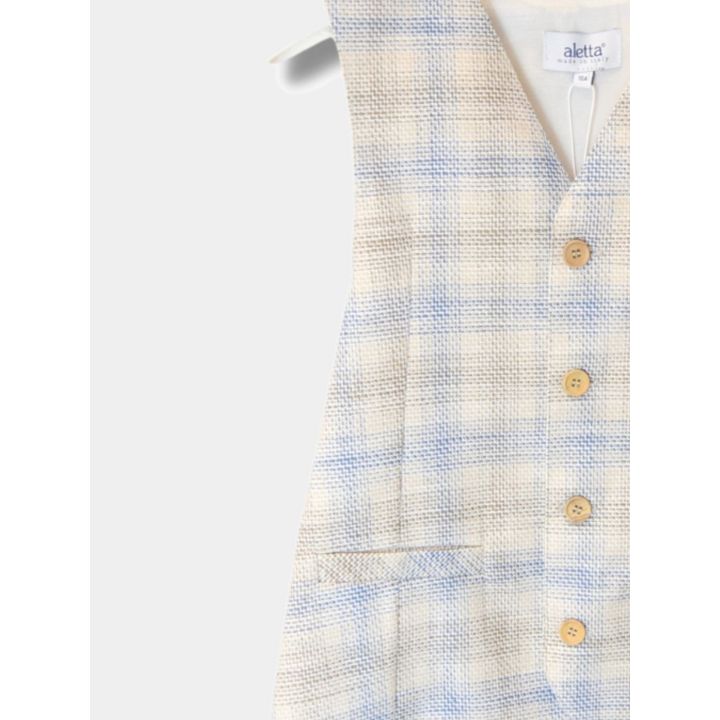 Gilet Aletta a quadri ecrù visto di tre quarti con lo scollo a V