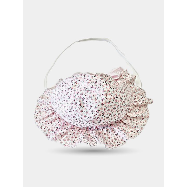 Cappello a fiorellini visto dall'alto con falda ondulata e laccetto