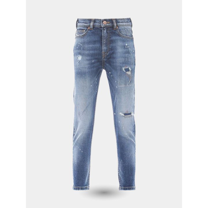 Jeans strappati Diesel blu da ragazzo vista frontale con rammendi