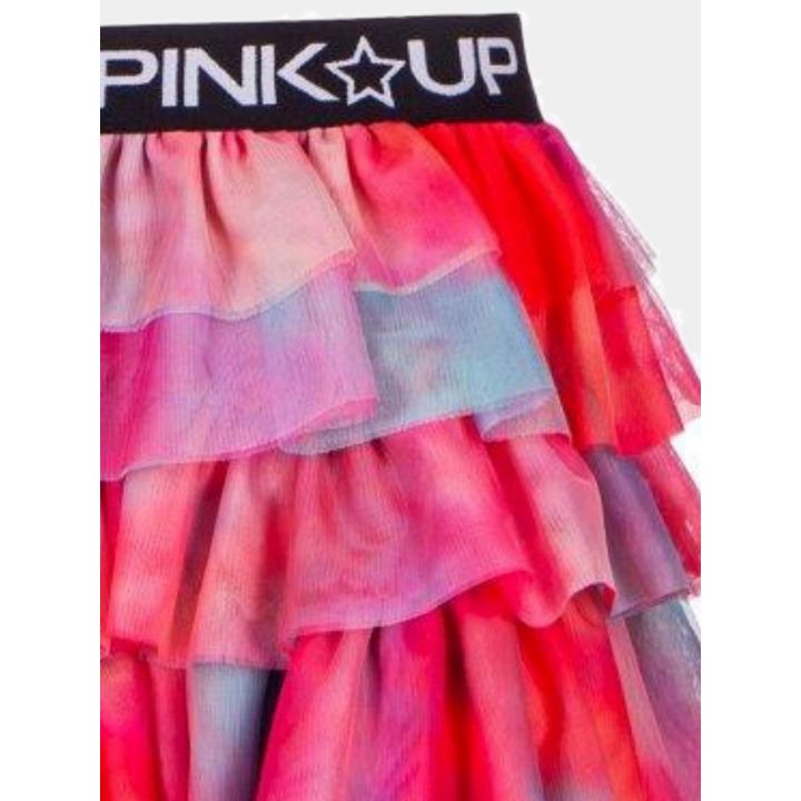 Dettaglio delle balze in tulle sfumate e della scritta Pink Up in vita