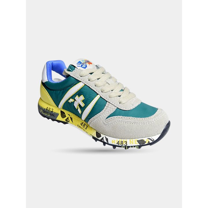 Sneakers Premiata verdi e gialle viste di tre quarti
