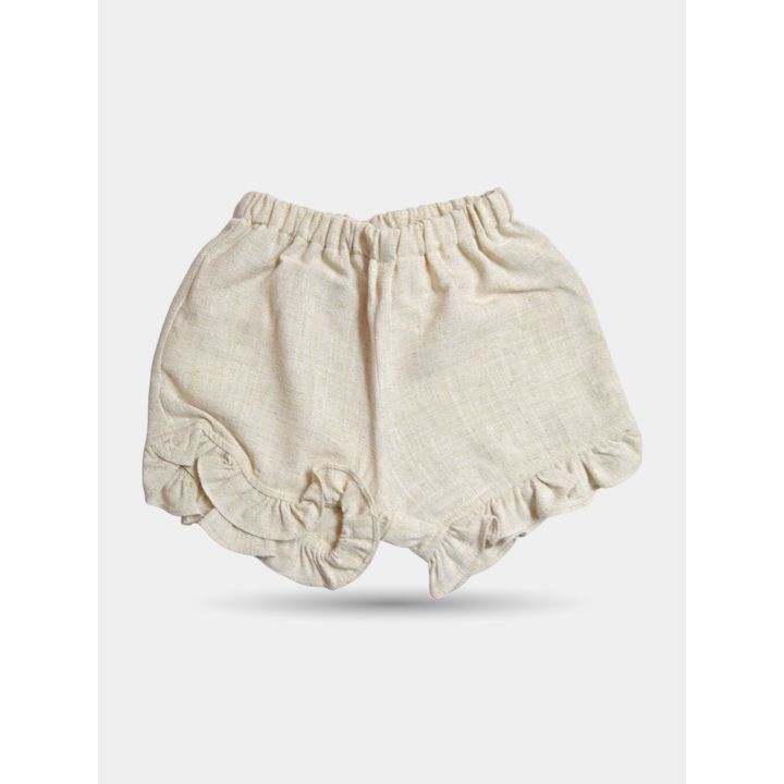Retro dei pantaloncini beige con elastico in vita e volant a ricciolo