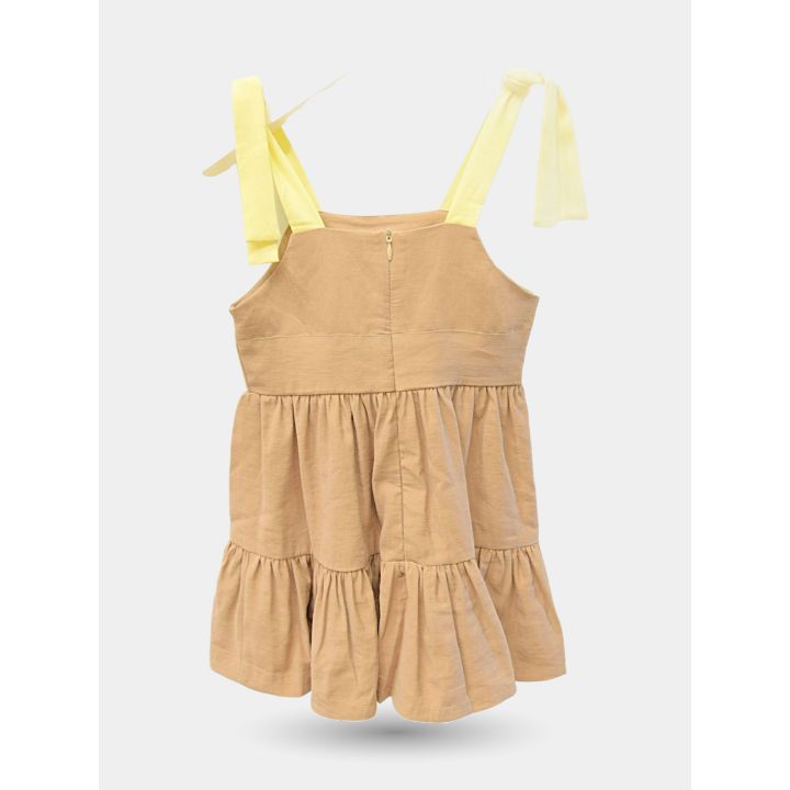 Retro dell'abito marrone con zip e spalline gialle annodate