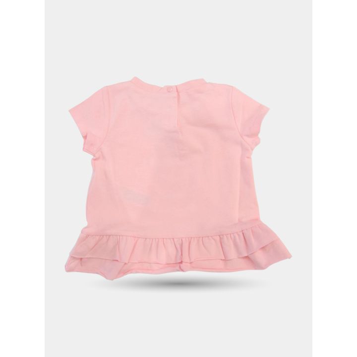 Retro della t-shirt rosa a maniche corte con bottoncino al collo