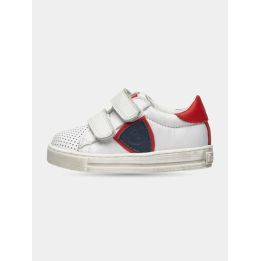Sneakers Falcotto bianche con scudetto blu e tallone rosso, vista laterale