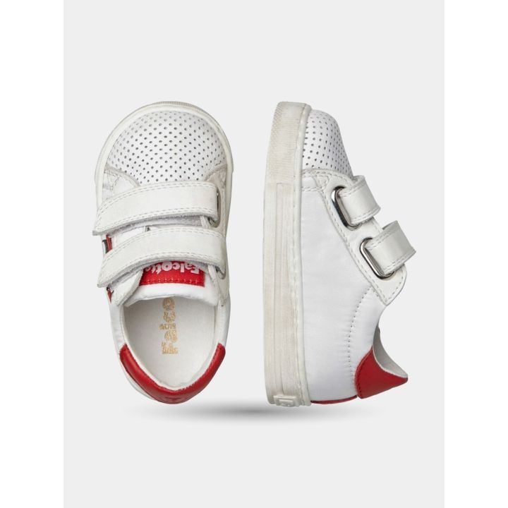 Sneakers bianche Falcotto viste dall'alto e di lato con due strappi