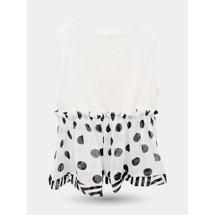 Retro della blusa smanicata con balza a pois e bordo a righe