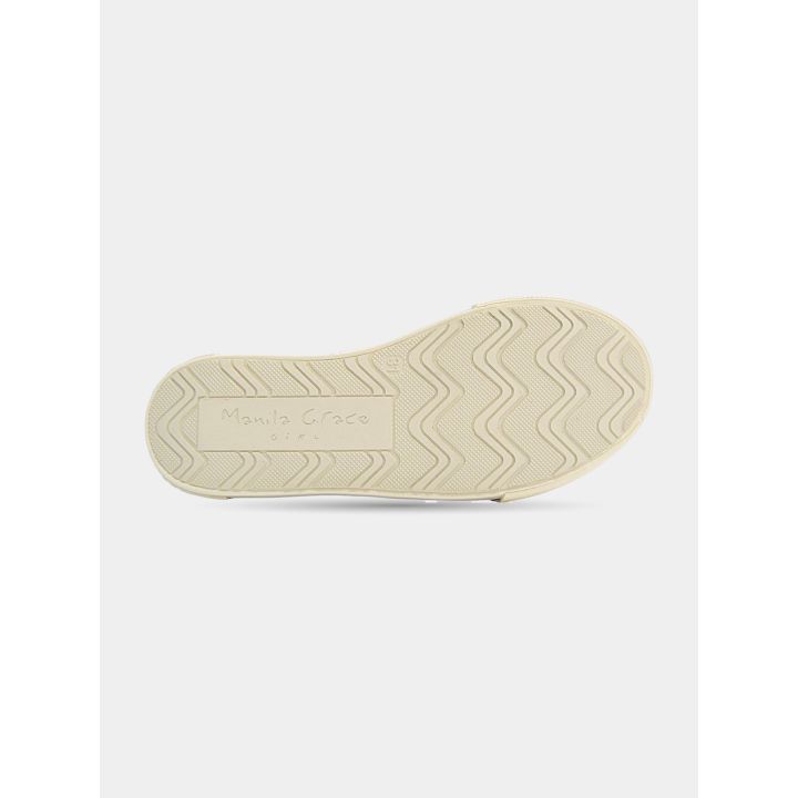 Suola chiara delle sneakers a pois con logo Manila Grace
