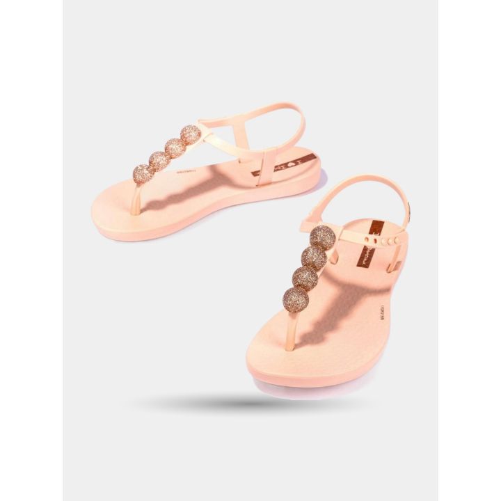 Sandali infradito Ipanema rosa cipria con sfere glitter oro rosa, vista angolata