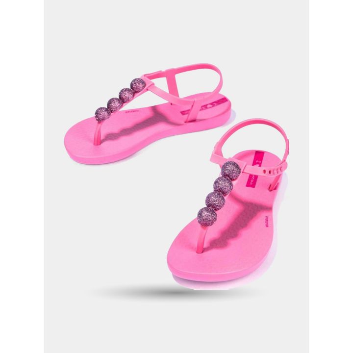 Sandali infradito Ipanema fucsia con sfere glitter viola, vista angolata