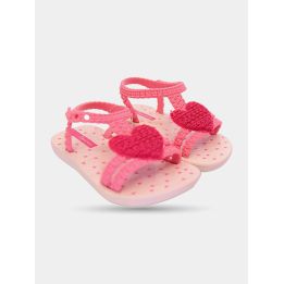 Ciabatte Ipanema bambina rosa con cuore fucsia, paio di tre quarti
