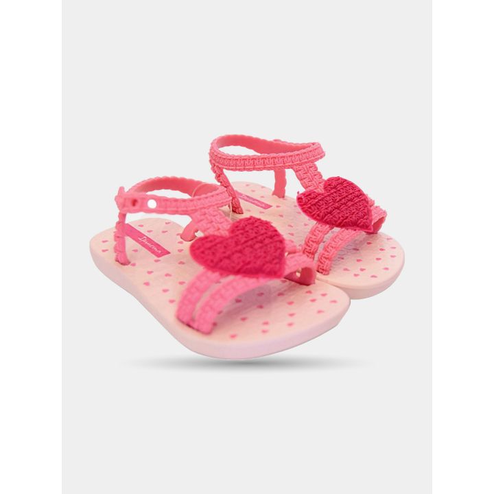 Ciabatte Ipanema bambina rosa con cuore fucsia, paio di tre quarti