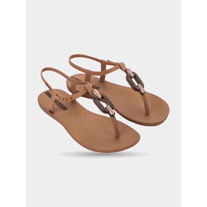 Sandali infradito Ipanema beige con anello metallizzato, paio di tre quarti
