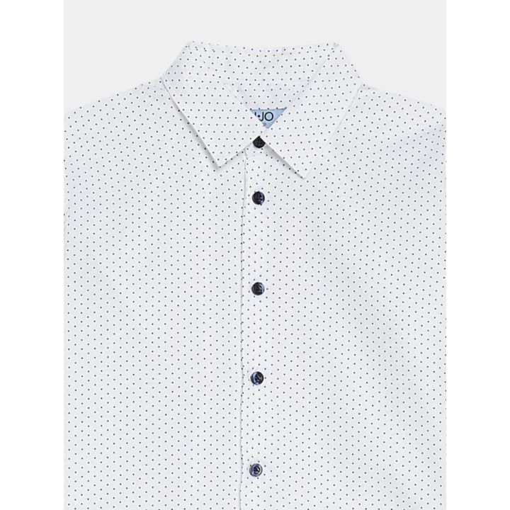 Dettaglio del colletto e dei bottoni blu della camicia a pois Liu Jo