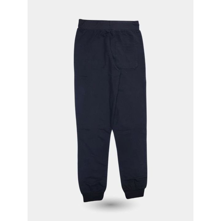 Retro del pantalone nero della tuta Kappa da ragazzo