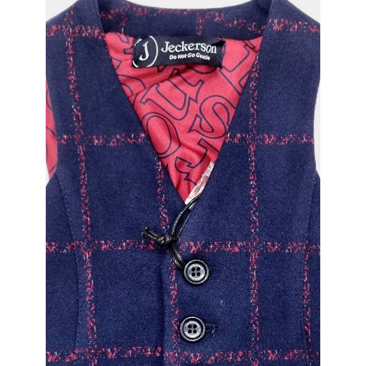 Interno rosso stampato ed etichetta Jeckerson del gilet a quadri