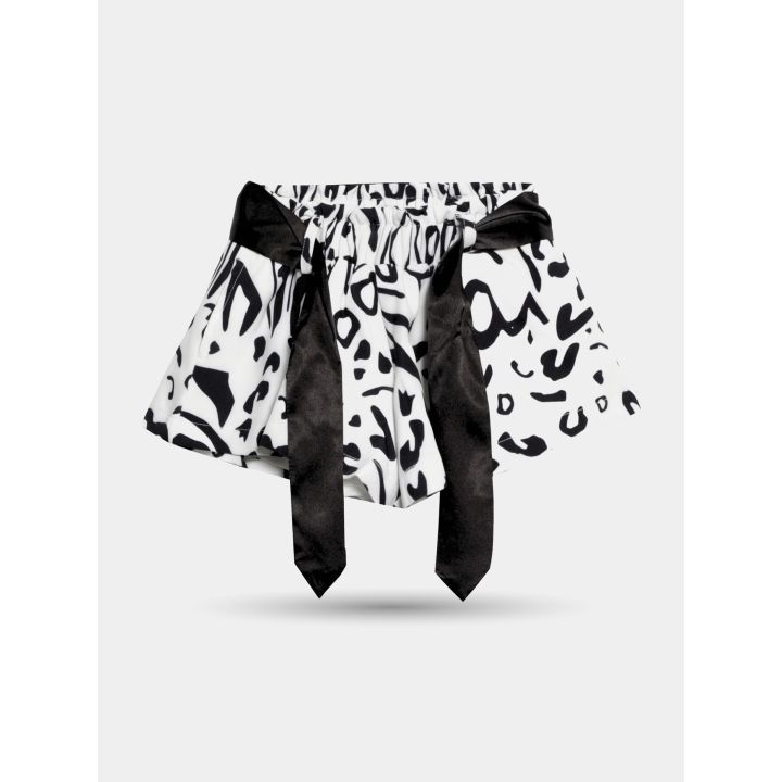 Pantaloncini FUN&FUN animalier bianchi e neri con fiocco nero lucido vista frontale