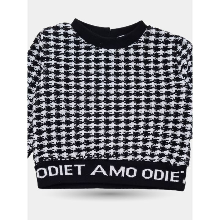 Dettaglio del motivo pied de poule e della fascia con scritta Odi et Amo