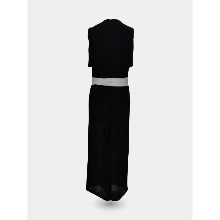 Retro dell'abito tuta nero con zip e cintura bianca