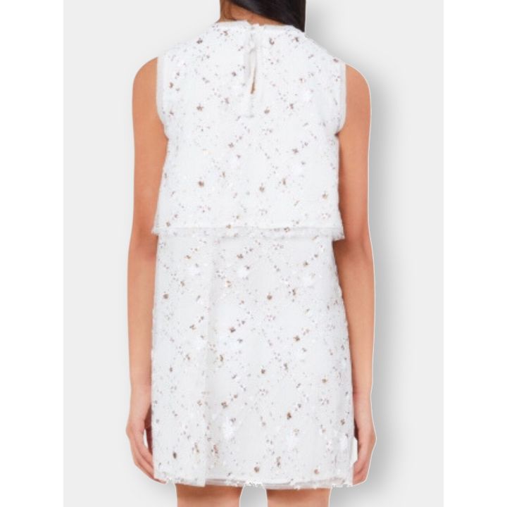 Retro dell'abito bianco con paillettes e chiusura a bottone