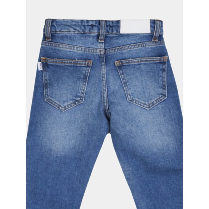 Dettaglio delle tasche posteriori dei jeans MSGM