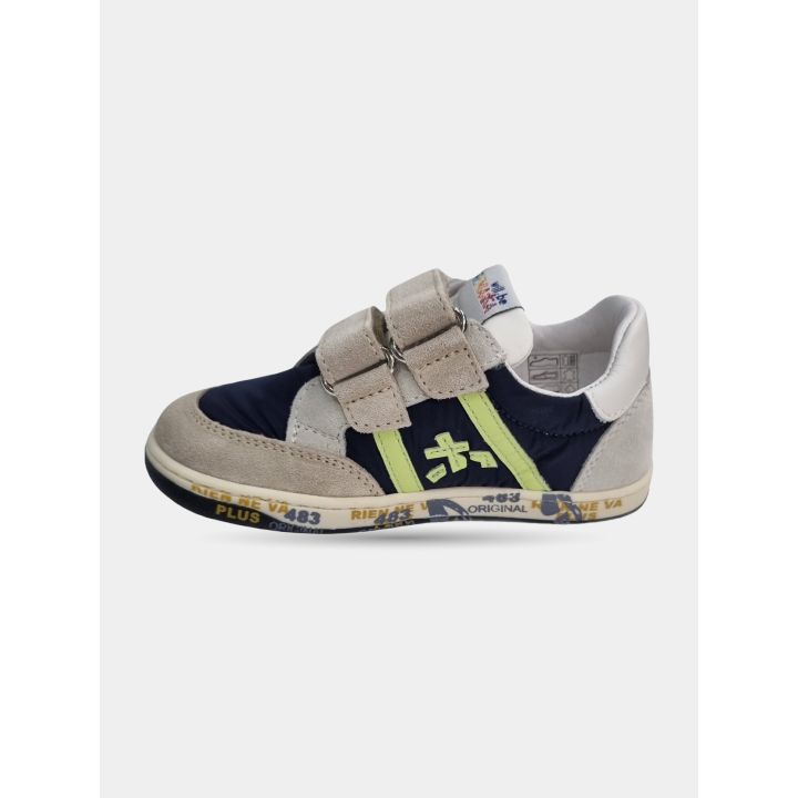 Sneakers Premiata beige e blu, lato interno con il logo verde lime