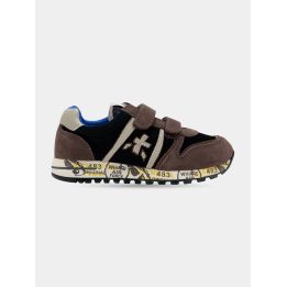Sneakers Premiata marroni e nere con strappi, vista laterale