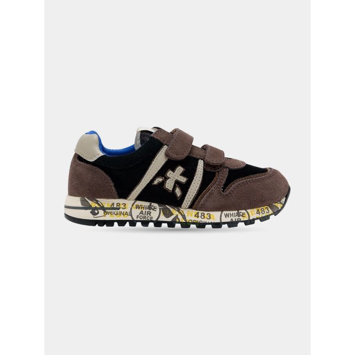 Sneakers Premiata marroni e nere con strappi, vista laterale