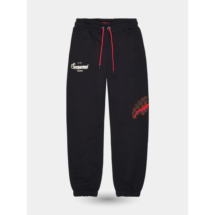 Pantalone tuta Sprayground nero vista frontale con logo e squalo a scacchi
