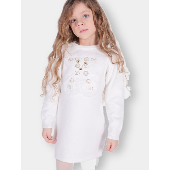 Abito FUN&FUN bianco a maniche lunghe indossato da una bambina