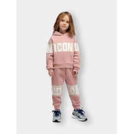 Tuta ICON rosa indossata da una bambina con felpa con cappuccio e fascia logata