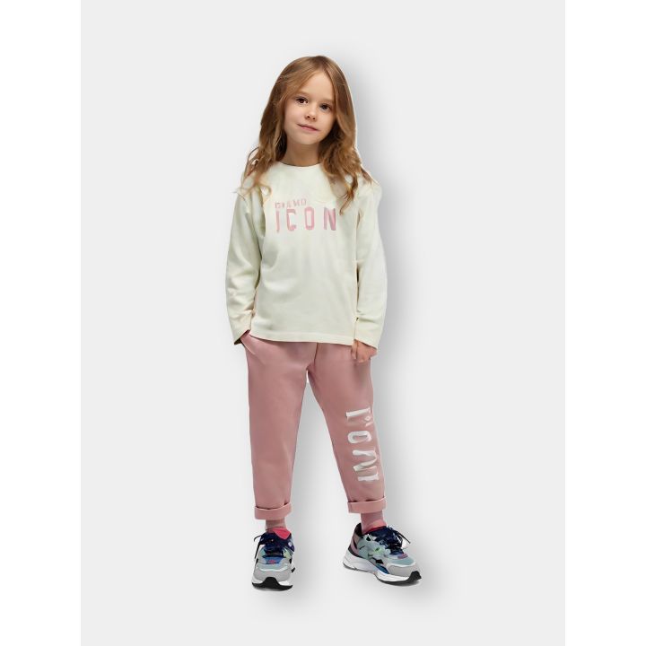 Completo ICON indossato da una bambina con maglia panna e leggings rosa