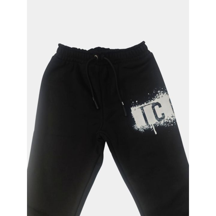 Pantalone ICON nero con coulisse e logo spray sulla gamba