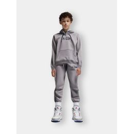 Tuta ICON grigia indossata da un ragazzo con felpa con cappuccio e pantalone