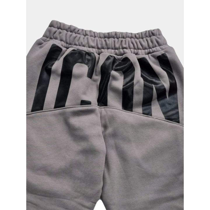 Retro del pantalone della tuta ICON grigia con maxi logo nero