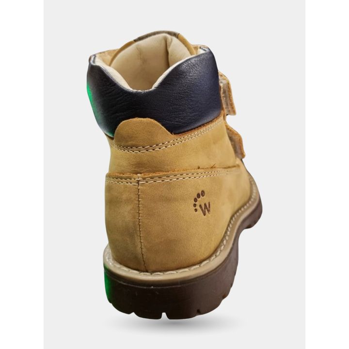 Retro dello stivaletto Walkey giallo con il collo scuro e il logo W