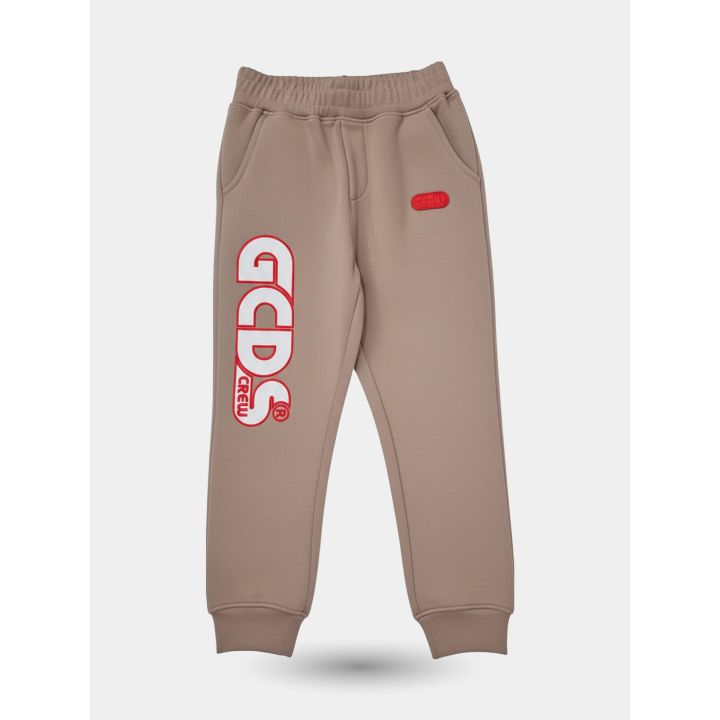 Pantalone tuta GCDS fango vista frontale con maxi logo Crew sulla gamba
