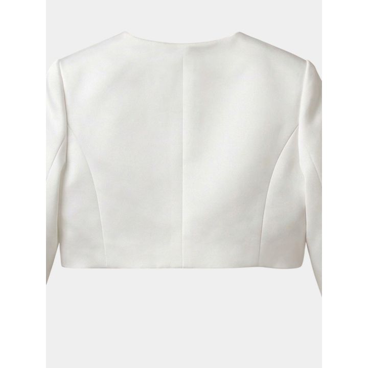 Dettaglio del retro liscio del bolero bianco