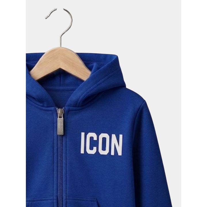 Dettaglio del logo ICON bianco e del tiretto della zip