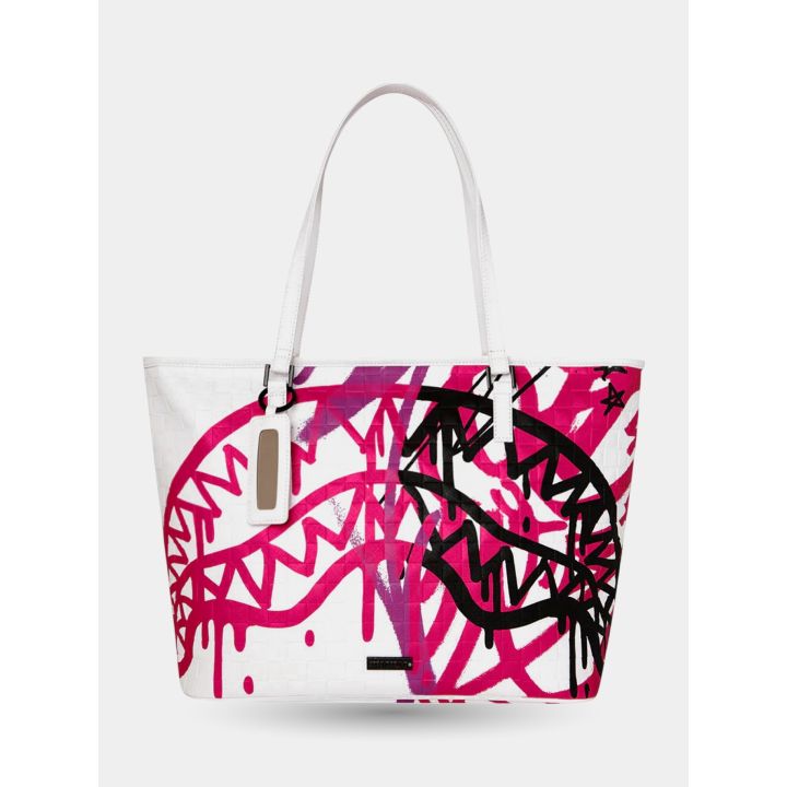 Borsa Sprayground bianca vista frontale con squali graffiti fucsia e neri