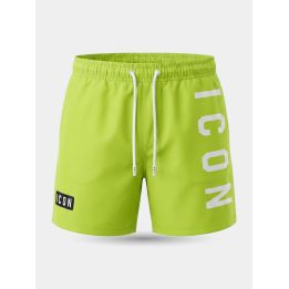Costume ICON verde neon da ragazzo vista frontale con logo verticale