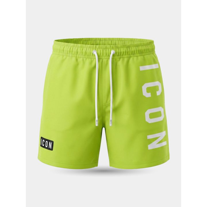 Costume ICON verde neon da ragazzo vista frontale con logo verticale