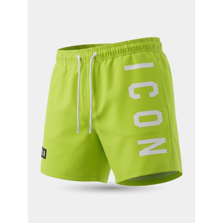 Costume ICON verde neon vista di tre quarti con maxi logo bianco