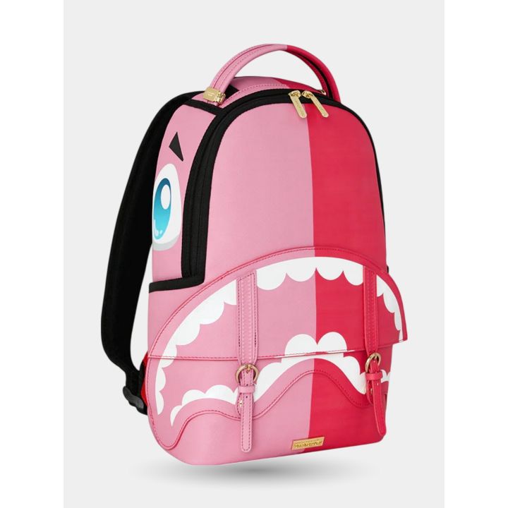 Zaino Sprayground mini rosa Kawaii visto di tre quarti con occhio e sorriso
