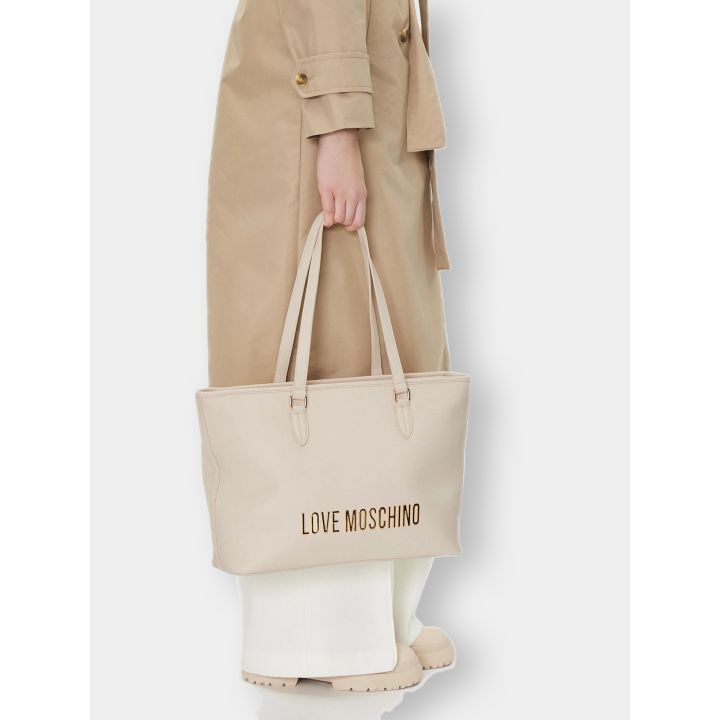 Borsa shopper Love Moschino avorio portata a mano