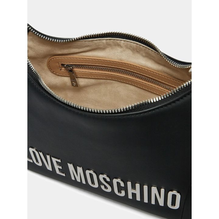 Interno della borsa nera con zip aperta e tasca con zip